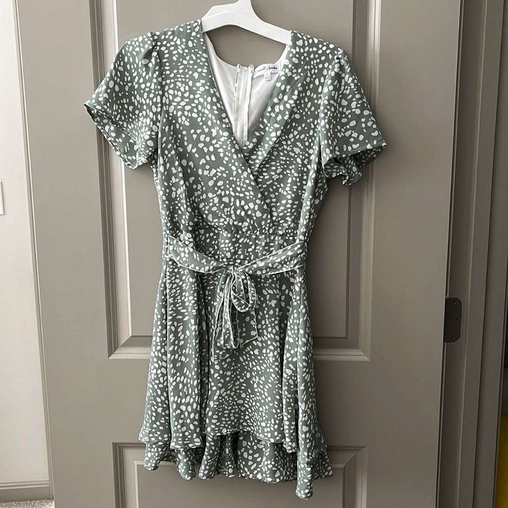 Emerald sundae romper size 1. Green and white